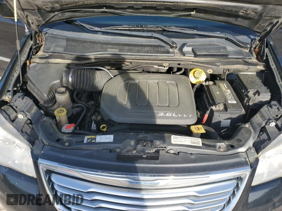 2015 Chrysler Town & Country Touring with VIN 2C4RC1BG3FR570958, listed as a Copart auction lot 54717775 with 306,883 mi miles and Clean Title. Bid and sale history available at carsss.com. Image 12.