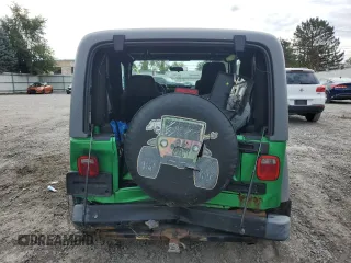 2005 Jeep Wrangler Sport with VIN 1J4FA49S95P315455, listed as a Copart auction lot 73159804 with 108,419 mi miles and Salvage Title. Bid and sale history available at carsss.com. Image 6.