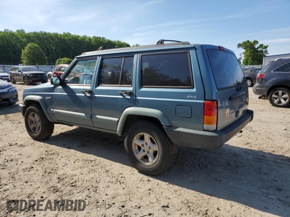 1998 Jeep Cherokee Sport with VIN 1J4FJ68S6WL283022, listed as a Copart auction lot 57451125 with 207,618 mi miles and Salvage title. Bid and sale history available at DreamBid. Image 2.