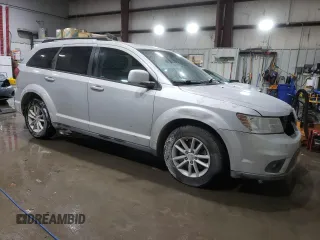 2013 Dodge Journey SXT with VIN 3C4PDCBB1DT558323, listed as a Copart auction lot 45953885 with 165,781 mi miles and Salvage Title. Bid and sale history available at DreamBid. Image 4.