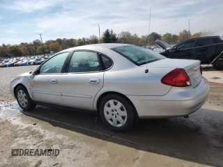 2003 Ford Taurus LX Standard z VIN 1FAFP52U93A159333, wystawiony jako Copart lot #78080944 z przebiegiem 54 652 mil mil oraz Szkoda całkowita • Salvage title. Historia ofert i sprzedaży dostępna na DreamBid. Obrazek 2.
