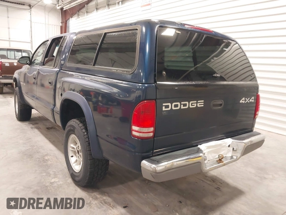2000 Dodge Dakota Sport with VIN 1B7GG2AN6YS636308, listed as a IAAI auction lot 42405180 with 171,266 mi miles and . Bid and sale history available at DreamBid. Image 3.