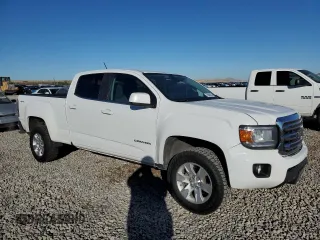 2015 GMC Canyon 4WD SLE with VIN 1GTG6BE32F1185781, listed as a Copart auction lot 79688404 with 199,781 mi miles and Salvage Title. Bid and sale history available at carsss.com. Image 4.