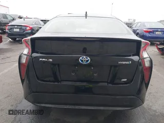 2016 Toyota Prius Four z VIN JTDKARFU4G3005103, wystawiony jako IAAI lot #41807171 z przebiegiem 127 105 mil mil oraz . Historia ofert i sprzedaży dostępna na DreamBid. Obrazek 17.