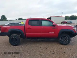 2019 Toyota Tacoma SR5 with VIN 3TMAZ5CN1KM092783, listed as a IAAI auction lot 42181784 with 86,272 mi miles and . Bid and sale history available at DreamBid. Image 14.
