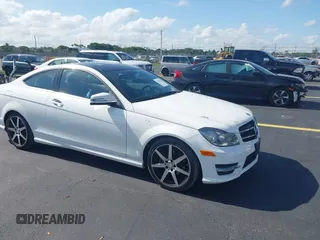 2015 Mercedes-Benz C 250 with VIN WDDGJ4HB4FG410766, listed as a IAAI auction lot 42307457 with 50,979 mi miles and . Bid and sale history available at DreamBid. Image 1.