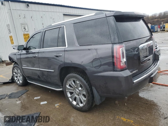 2016 GMC Yukon Denali with VIN 1GKS2CKJ4GR369125, listed as a Copart auction lot 49224914 with 149,356 mi miles and Salvage Title. Bid and sale history available at carsss.com. Image 2.