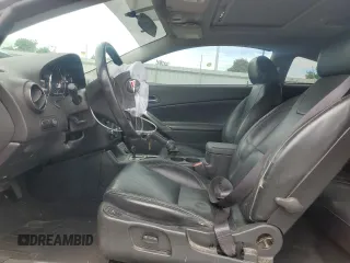 2006 Pontiac G6 GT with VIN 1G2ZH158664144243, listed as a Copart auction lot 57622335 with 104,684 mi miles and Salvage title. Bid and sale history available at DreamBid. Image 7.