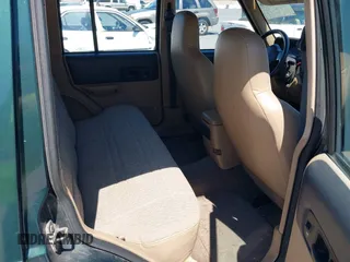 1999 Jeep Cherokee Sport with VIN 1J4FF68S0XL640066, listed as a IAAI auction lot 42768166 with 196,290 mi miles and . Bid and sale history available at DreamBid. Image 8.
