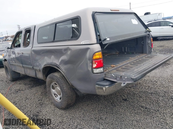 2000 Toyota Tundra SR5 with VIN 5TBRT3414YS086059, listed as a IAAI auction lot 41609962 with 105,030 mi miles and . Bid and sale history available at DreamBid. Image 3.