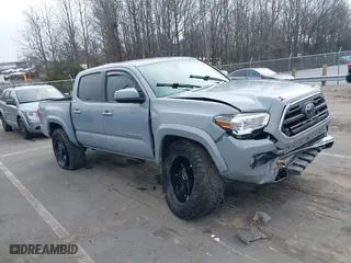 2019 Toyota Tacoma 4WD SR with VIN 3TMCZ5AN4KM204455, listed as a IAAI auction lot 41223185 with 77,144 mi miles. Bid and sale history available at carsss.com. Image 1.
