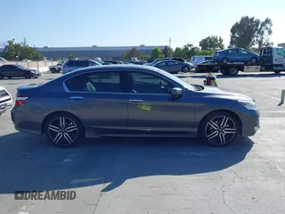 2017 Honda Accord Touring with VIN 1HGCR3F97HA030310, listed as a IAAI auction lot 42539852 with 64,849 mi miles and . Bid and sale history available at DreamBid. Image 13.