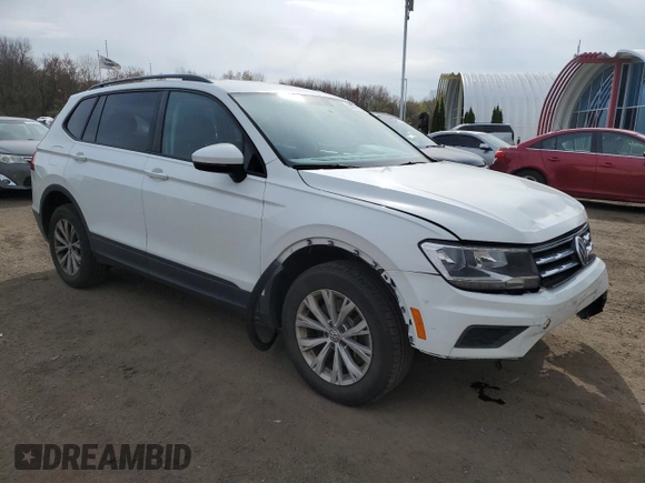 2019 Volkswagen Tiguan S with VIN 3VV0B7AX7KM106090, listed as a Copart auction lot 54771435 with 101,711 mi miles and Salvage title. Bid and sale history available at DreamBid. Image 4.