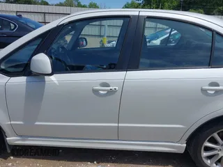 2008 Suzuki SX4 Touring 2 z VIN JS2YC417285100960, wystawiony jako IAAI lot #42166346 z przebiegiem 162 498 mil mil oraz . Historia ofert i sprzedaży dostępna na DreamBid. Obrazek 14.