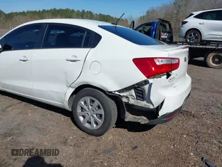 2014 Kia Rio LX with VIN KNADM4A30E6403029, listed as a IAAI auction lot 41717924 with 61,192 mi miles. Bid and sale history available at carsss.com. Image 6.