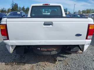 1999 Ford Ranger XLT with VIN 1FTYR14X0XPA65325, listed as a IAAI auction lot 42009611 with 218,657 mi miles. Bid and sale history available at carsss.com. Image 6.