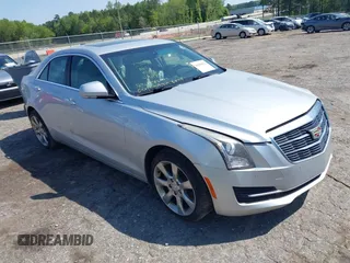 2015 Cadillac ATS Luxury RWD z VIN 1G6AB5RX9F0143908, wystawiony jako IAAI lot #42010633 z przebiegiem 84 942 mil mil oraz . Historia ofert i sprzedaży dostępna na DreamBid. Obrazek 1.