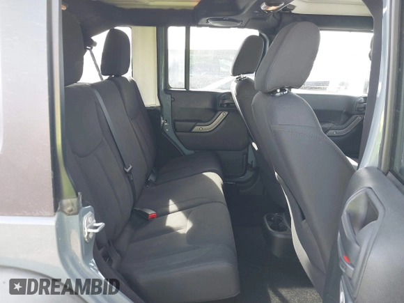 2014 Jeep Wrangler Unlimited Sport with VIN 1C4BJWDG9EL309763, listed as a IAAI auction lot 41378132 with 117,029 mi miles. Bid and sale history available at carsss.com. Image 8.