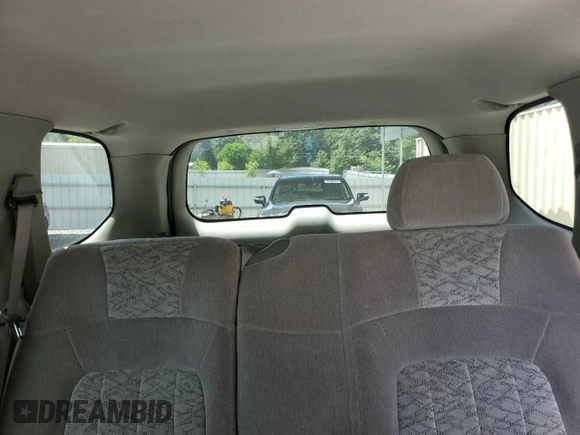 2004 GMC Envoy SLE with VIN 1GKDS13S942119615, listed as a Copart auction lot 69653494 with 141,856 mi miles and Salvage Title. Bid and sale history available at carsss.com. Image 10.