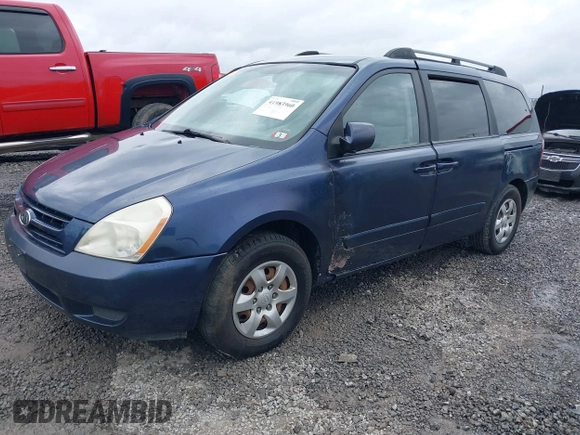 2009 Kia Sedona LX with VIN KNDMB233696278019, listed as a IAAI auction lot 41983960 with 153,083 mi miles. Bid and sale history available at carsss.com. Image 2.
