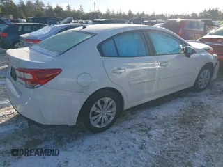 2020 Subaru Impreza with VIN 4S3GKAB61L3600402, listed as a IAAI auction lot 41306036 with 74,468 mi miles and . Bid and sale history available at DreamBid. Image 4.