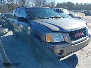 2005 GMC Envoy SLE with VIN 1GKDS13S752205538, listed as a IAAI auction lot 41585911 with 201,703 mi miles. Bid and sale history available at carsss.com. Image 1.