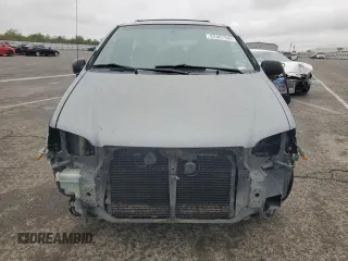 2000 Toyota Sienna LE with VIN 4T3ZF13C2YU217185, listed as a Copart auction lot 82407944 with 244,381 mi miles and Salvage Title. Bid and sale history available at carsss.com. Image 5.