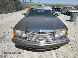 1987 Mercedes-Benz 420 with VIN WDBCA35D0HA311262, listed as a Copart auction lot 71760554 with 185,520 mi miles and Salvage Title. Bid and sale history available at carsss.com. Image 5.