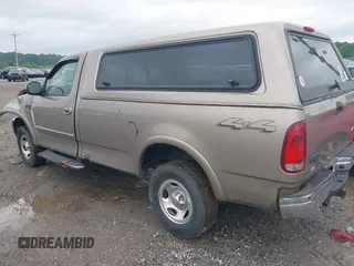 2001 Ford F-150 XL with VIN 1FTRF18W11NA61110, listed as a IAAI auction lot 42288546 with Not provided miles and . Bid and sale history available at DreamBid. Image 3.