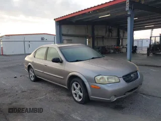 2000 Nissan Maxima GXE z VIN JN1CA31D4YT539490, wystawiony jako IAAI lot #42060487 z przebiegiem 206 683 mil mil oraz . Historia ofert i sprzedaży dostępna na DreamBid. Obrazek 1.