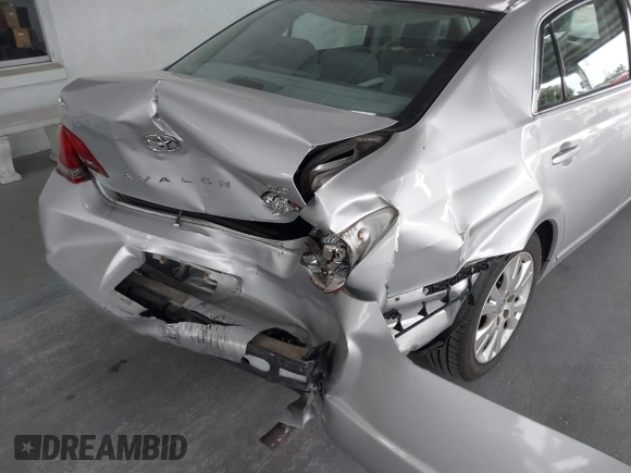 2009 Toyota Avalon XL with VIN 4T1BK36B69U341854, listed as a IAAI auction lot 41727553 with 102,369 mi miles. Bid and sale history available at carsss.com. Image 6.