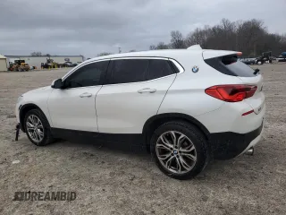 2019 BMW X2 sDrive28i with VIN WBXYJ3C58K5N39693, listed as a Copart auction lot 86760414 with 77,668 mi miles and Salvage Title. Bid and sale history available at carsss.com. Image 2.