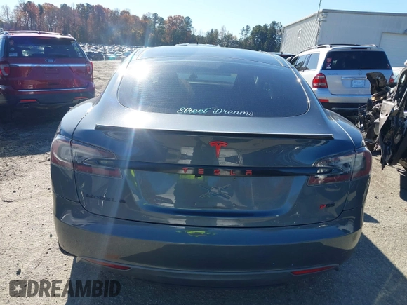 2013 Tesla Model S Performance with VIN 5YJSA1DP7DFP11737, listed as a IAAI auction lot 40915195 with Not provided miles and . Bid and sale history available at DreamBid. Image 15.