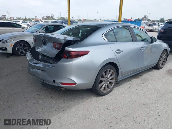 2020 Mazda 3 Select with VIN 3MZBPACL6LM131481, listed as a IAAI auction lot 42118795 with 104,102 mi miles and . Bid and sale history available at DreamBid. Image 4.