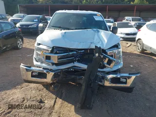 2018 Ford F-150 XL with VIN 1FTEW1E55JKF29898, listed as a IAAI auction lot 40593129 with 158,663 mi miles and . Bid and sale history available at carsss.com. Image 6.