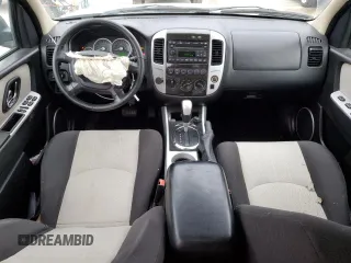 2005 Mercury Mariner Luxury z VIN 4M2CU57105DJ33266, wystawiony jako Copart lot #87002044 z przebiegiem 164 313 mil mil oraz Szkody całkowita. Historia ofert i sprzedaży dostępna na DreamBid. Obrazek 8.