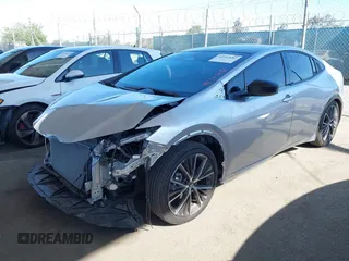 2024 Toyota Prius LE z VIN JTDACAAU0R3034244, wystawiony jako IAAI lot #42312682 z przebiegiem 4 102 mil mil oraz . Historia ofert i sprzedaży dostępna na DreamBid. Obrazek 2.