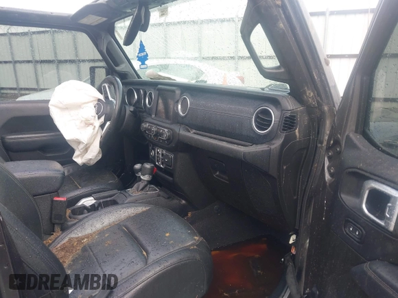 2019 Jeep Wrangler Unlimited Sahara with VIN 1C4HJXEG8KW627530, listed as a IAAI auction lot 42122544 with 118,064 mi miles and . Bid and sale history available at DreamBid. Image 5.