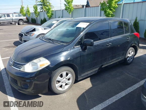 2009 Nissan Versa 1.8 SL with VIN 3N1BC13E99L409145, listed as a IAAI auction lot 42151530 with 150,930 mi miles. Bid and sale history available at carsss.com. Image 2.