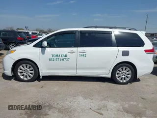 2014 Toyota Sienna LE with VIN 5TDJK3DC5ES081232, listed as a IAAI auction lot 41789629 with 397,033 mi miles and . Bid and sale history available at DreamBid. Image 14.