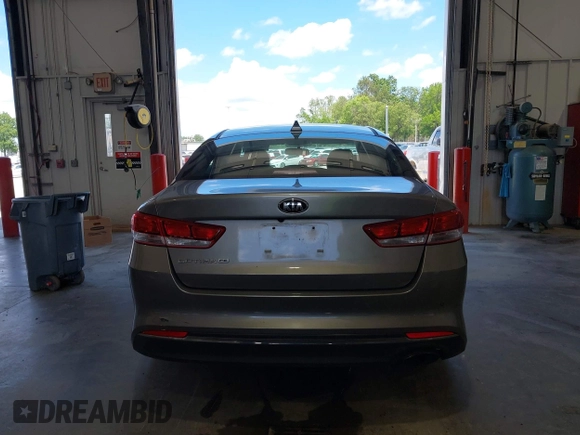 2018 Kia Optima S with VIN 5XXGT4L35JG209561, listed as a IAAI auction lot 42526577 with 161,906 mi miles and . Bid and sale history available at DreamBid. Image 16.