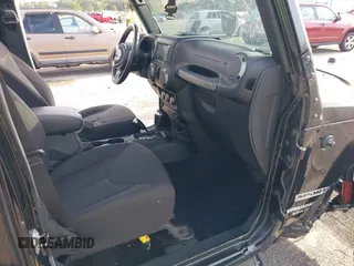 2016 Jeep Wrangler Unlimited Sport with VIN 1C4BJWDG6GL328550, listed as a IAAI auction lot 42741356 with 32,120 mi miles and . Bid and sale history available at DreamBid. Image 5.
