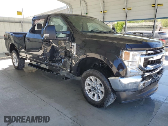 2022 Ford Super Duty F-250 SRW XL with VIN 1FT7W2BT7NEF85573, listed as a Copart auction lot 52827395 with 84,165 mi miles and Clean Title. Bid and sale history available at carsss.com. Image 4.