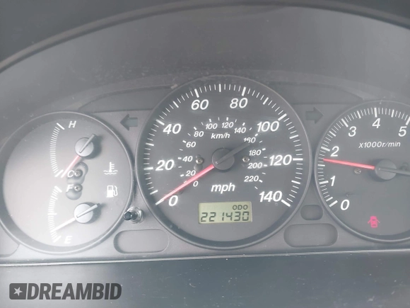 2000 Mazda Protege DX with VIN JM1BJ2223Y0212144, listed as a IAAI auction lot 41570436 with 221,430 mi miles and . Bid and sale history available at DreamBid. Image 7.