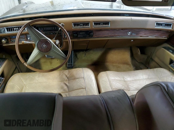 1976 Cadillac Eldorado z VIN 6L67S6Q235270, wystawiony jako Copart lot #80518554 z przebiegiem 4 944 mil mil oraz Szkoda całkowita • Salvage title. Historia ofert i sprzedaży dostępna na DreamBid. Obrazek 8.
