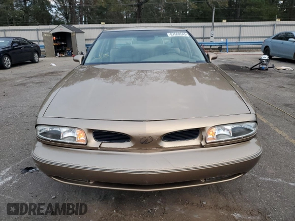 1998 Oldsmobile LSS z VIN 1G3HY52K2W4807516, wystawiony jako Copart lot #87669545 z przebiegiem Nie podano mil oraz Szkody całkowita. Historia ofert i sprzedaży dostępna na DreamBid. Obrazek 5.