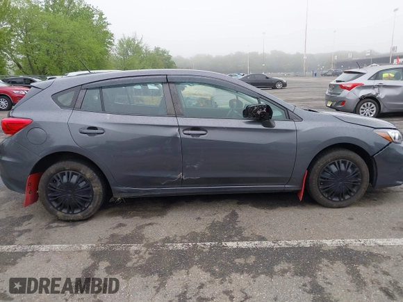 2019 Subaru Impreza with VIN 4S3GTAA69K1711062, listed as a IAAI auction lot 42187136 with 91,423 mi miles and . Bid and sale history available at DreamBid. Image 13.