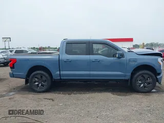 2023 Ford F-150 Lightning Pro with VIN 1FT6W1EVXPWG53591, listed as a IAAI auction lot 42249385 with 17,892 mi miles and . Bid and sale history available at DreamBid. Image 13.