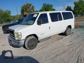 2010 Ford Econoline Passenger XL with VIN 1FBNE3BL9ADA86181, listed as a IAAI auction lot 41892206 with 240,310 mi miles. Bid and sale history available at carsss.com. Image 2.
