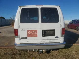 2002 Ford Econoline Passenger XL with VIN 1FBSS31S82HB36096, listed as a Copart auction lot 80654574 with 170,656 mi miles and Salvage title. Bid and sale history available at DreamBid. Image 6.
